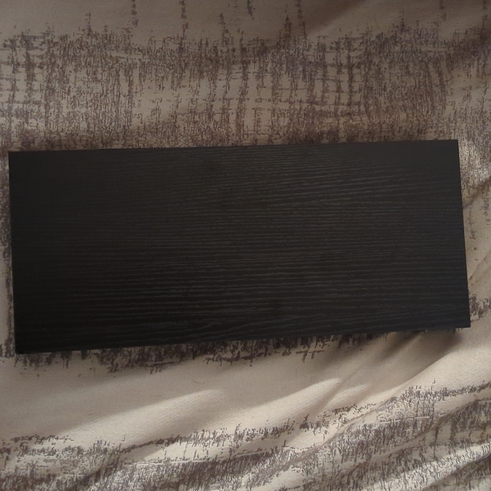Floating black shelves